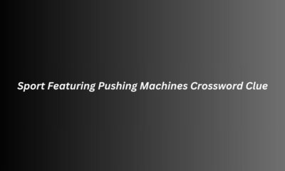 Sport Featuring Pushing Machines Crossword Clue